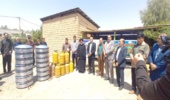 توزیع تنور و ساج گازی رایگان به ساکنین روستای سرکمر زرین آباد